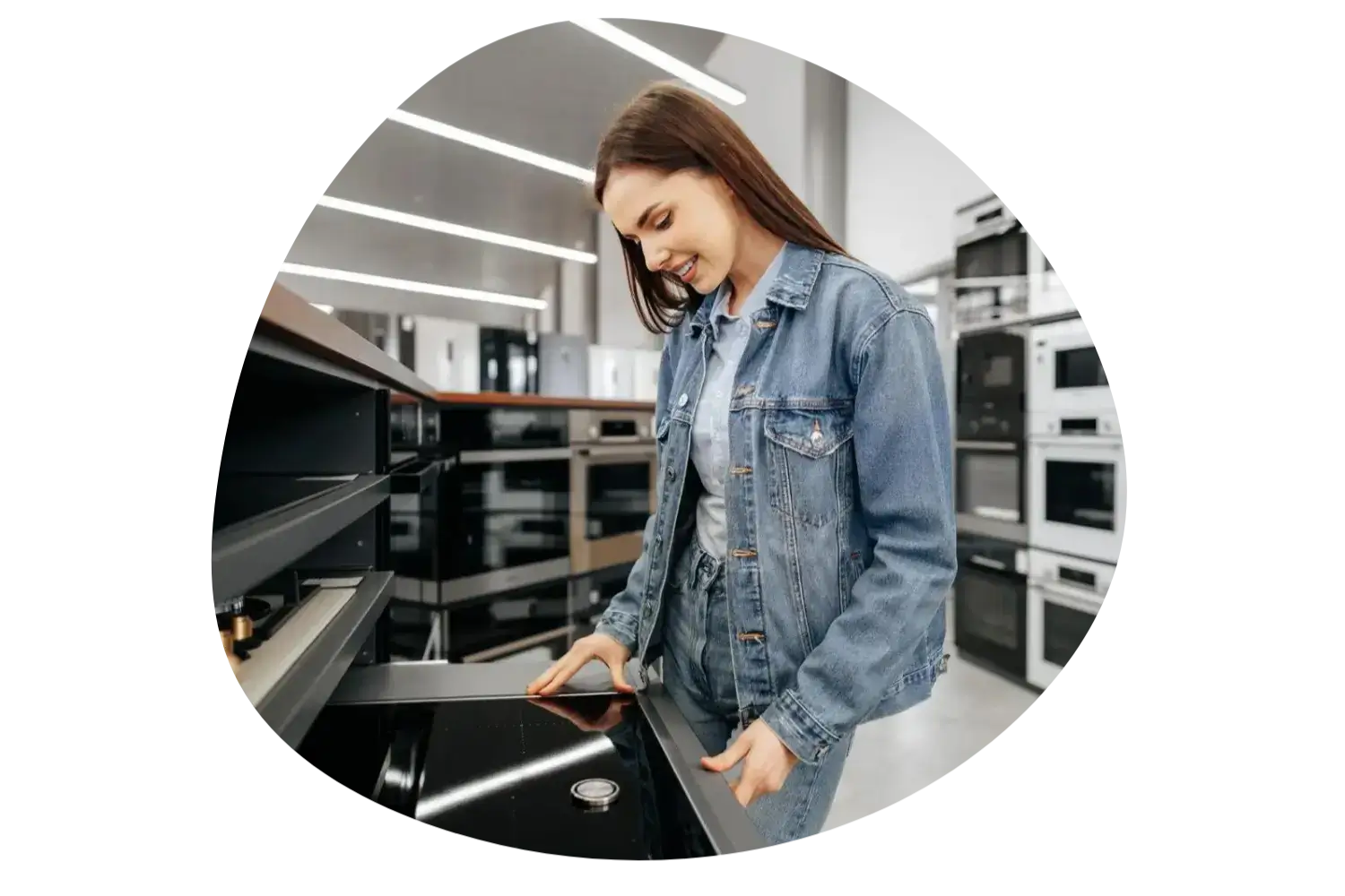 Professional appliance repair technician working on a washing machine